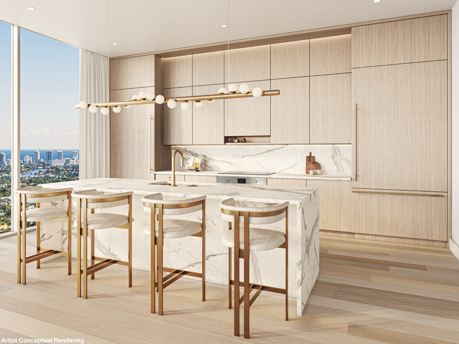 An ODA custom kitchen at Ombelle Fort Lauderdale — European oak cabinetry, a honed Calacatta porcelain waterfall island with brass-framed stools, integrated Smeg appliances, and floor-to-ceiling windows over the coastline.
