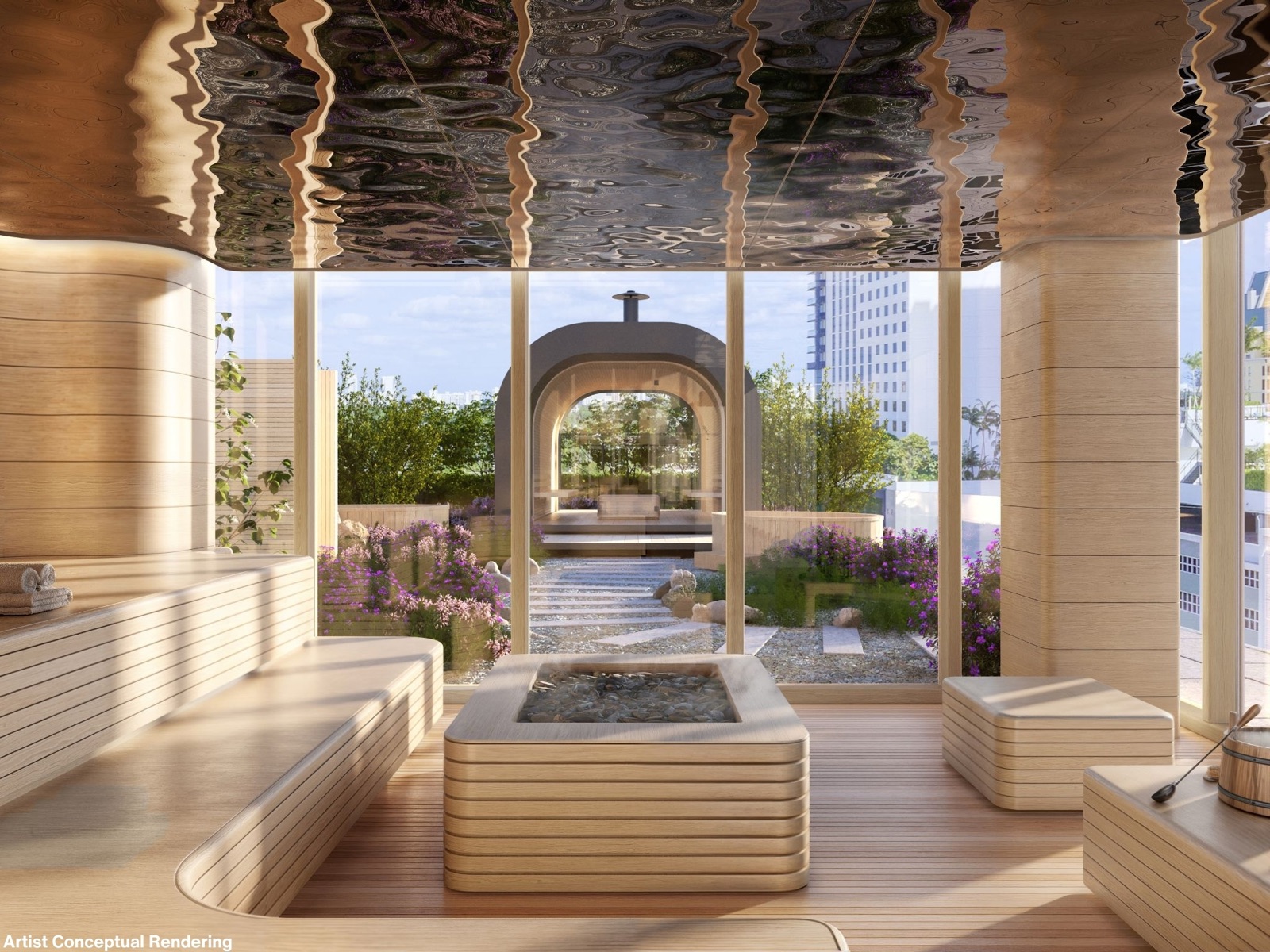 The sauna at Ombelle's Sanctuary — sculpted blond-wood benches around a stone hot-spring centerpiece, a mirrored ceiling, and glass walls to a Zen garden terrace with an arched outdoor shower.